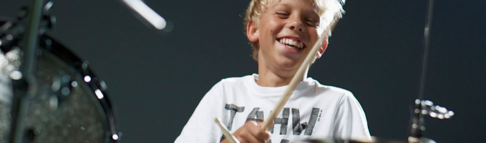 Schüler Kind Schlagzeugunterricht