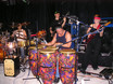 ﻿Auf diesem Bild die ganze Sessionband im drummer's focus München am 25. April 2006: 
Gitarristin Susan Weinert, Bassist Martin Weinert und Joey Heredia mit Raul Rekow