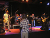 ﻿1.11.2005: Eröffnungsfeier df.K im Stadtgarten Köln:
Jörg Harsch und seine Session-Band PURPLE HENRY bringen ein fettes Rock-Set auf die Bühne
